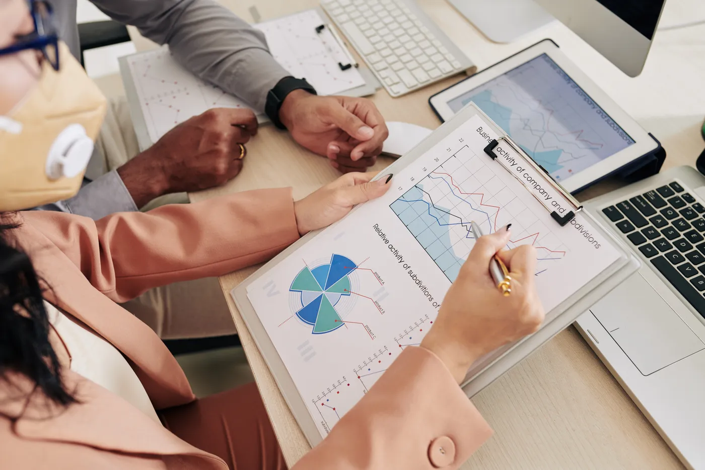Colleagues Analyzing Charts With Important Data 2025 01 29 08 37 07 Utc brighton-healthcare-cost-reduction-strategies-1